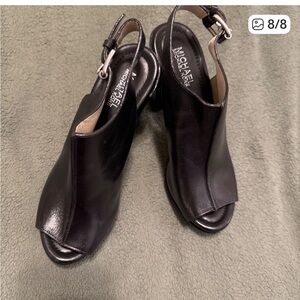 Gorgeous pair of Michael Kors sling back leather platform heels